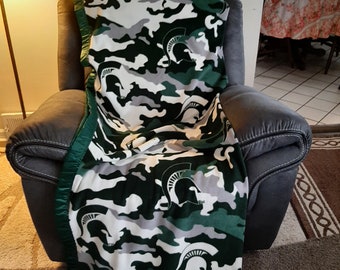 Michigan State University Camo, Adult Big/Tall Fleece Blanket with a green satin trim,