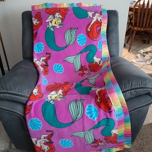 Ariel and Sebastian, Kids Fleece Blanket with a matching multi colored satin trim