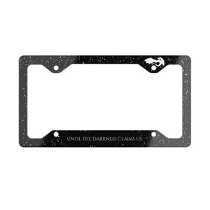 May include: Black license plate frame with a white dragon silhouette and the text "UNTIL THE DARKNESS CLAIMS US".