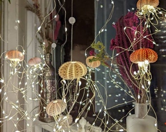 Beach core decoration, four urchin shells, string lights, bedroom accent, hanging on silver thread with rose quarts crystal beads