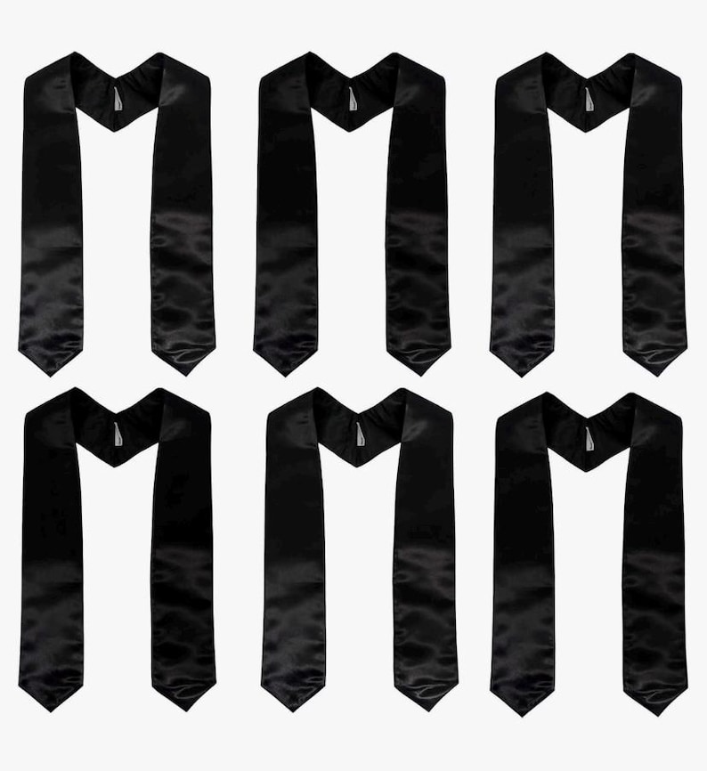 May include: Six black graduation stoles with a satin finish are displayed against a white backdrop. Each stole features a V-neck design and a pointed end. The stoles are arranged symmetrically, creating a balanced visual.
