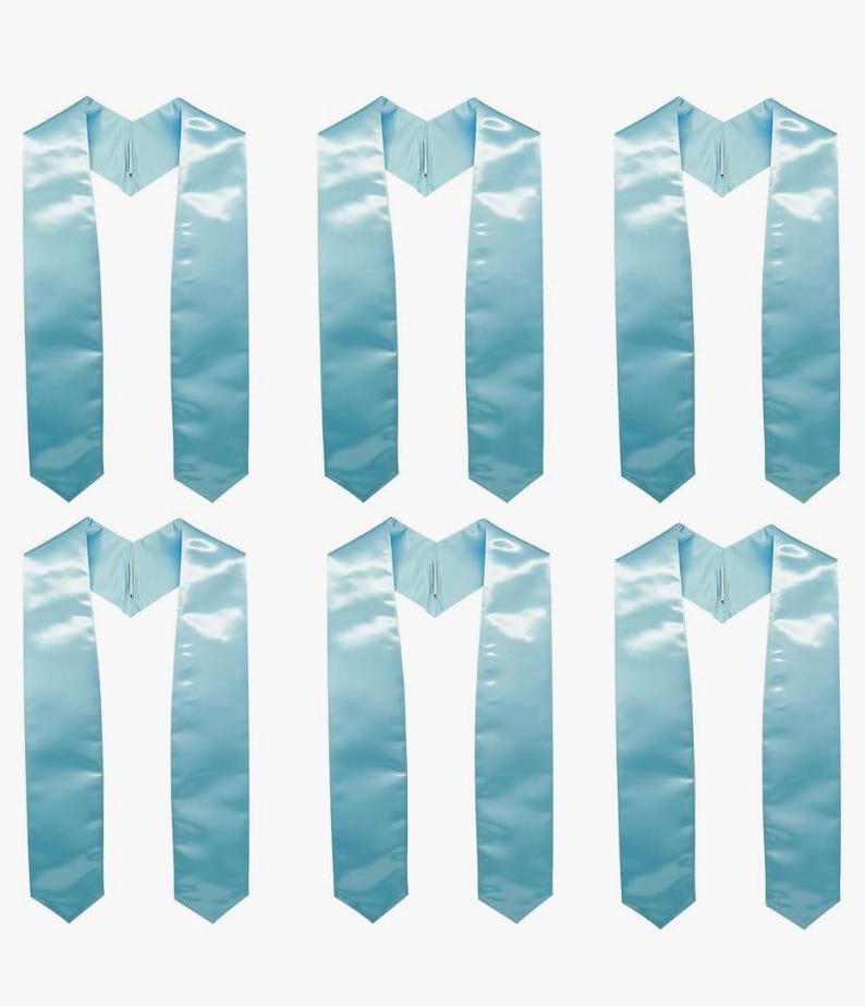 May include: Six pale blue graduation stoles are shown. Each satin stole features a V-neck design and a pointed end. The stoles are arranged in two rows of three, against a white backdrop. The fabric has a subtle sheen.