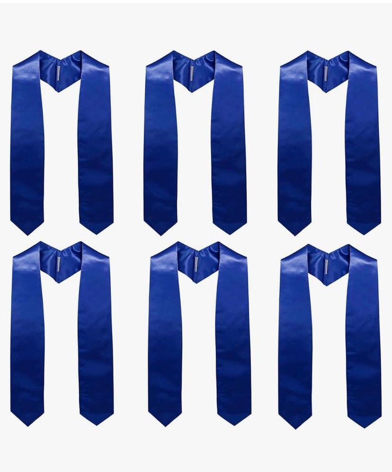 May include: Six royal blue graduation stoles. Each satin stole features a V-neck design and a pointed bottom. The stoles are arranged in a grid against a white background, emphasizing their vibrant colour and smooth texture.