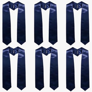 May include: Six navy blue graduation stoles on a white background. Each stole is made of a shiny, satin-like material and features a V-neck design. The stoles are arranged in a symmetrical pattern.