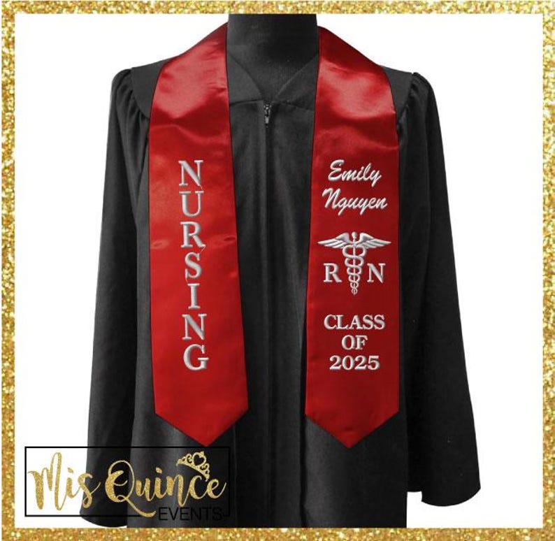 May include: Black graduation gown with a red satin sash. The sash is embroidered with the word "NURSING" in white, the name "Emily Nguyen", a caduceus symbol, the letters "RN", and "CLASS OF 2025". The image is framed with a gold glitter border.