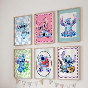 May include: Set of six framed art prints featuring the character Stitch from Lilo & Stitch. Each print showcases Stitch in various poses and settings, with colorful backgrounds and decorative borders. The prints are displayed on a white wall.