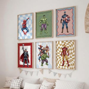 May include: A set of six framed wall art prints featuring Marvel superheroes. The prints display Spider-Man, Hulk, Captain America, Thor, a group of Avengers, and Iron Man, each set against distinct patterned or solid colored backgrounds.