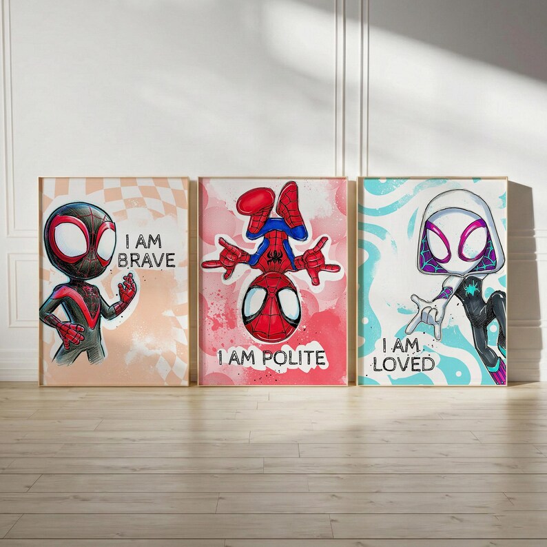 May include: Three framed art prints featuring Spider-Man characters. The first shows Miles Morales with the text "I AM BRAVE." The second features Spider-Man with "I AM POLITE." The third shows Spider-Gwen with "I AM LOVED."