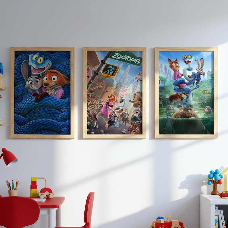 May include: Three framed Zootopia movie posters. The posters feature colorful illustrations of the characters Judy Hopps, Nick Wilde, and other animals in various scenes. The frames are made of light-colored wood.