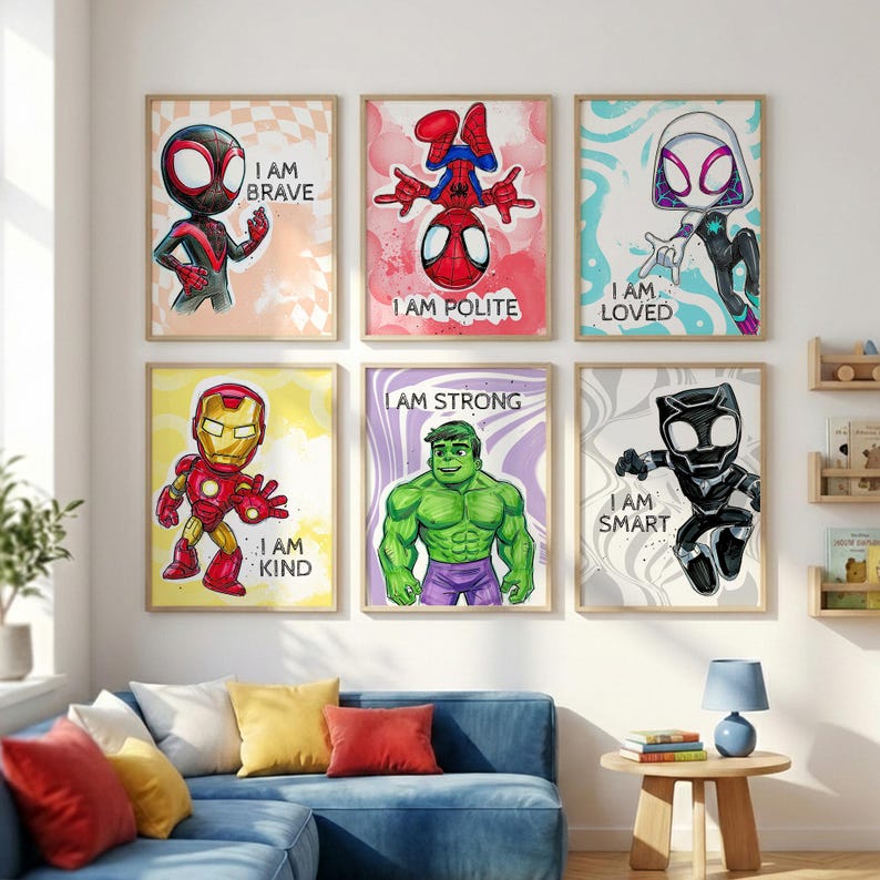 May include: Six framed superhero art prints. Each print features a different character with the phrases "I AM BRAVE", "I AM POLITE", "I AM LOVED", "I AM KIND", "I AM STRONG", and "I AM SMART". The prints are displayed above a blue sofa.