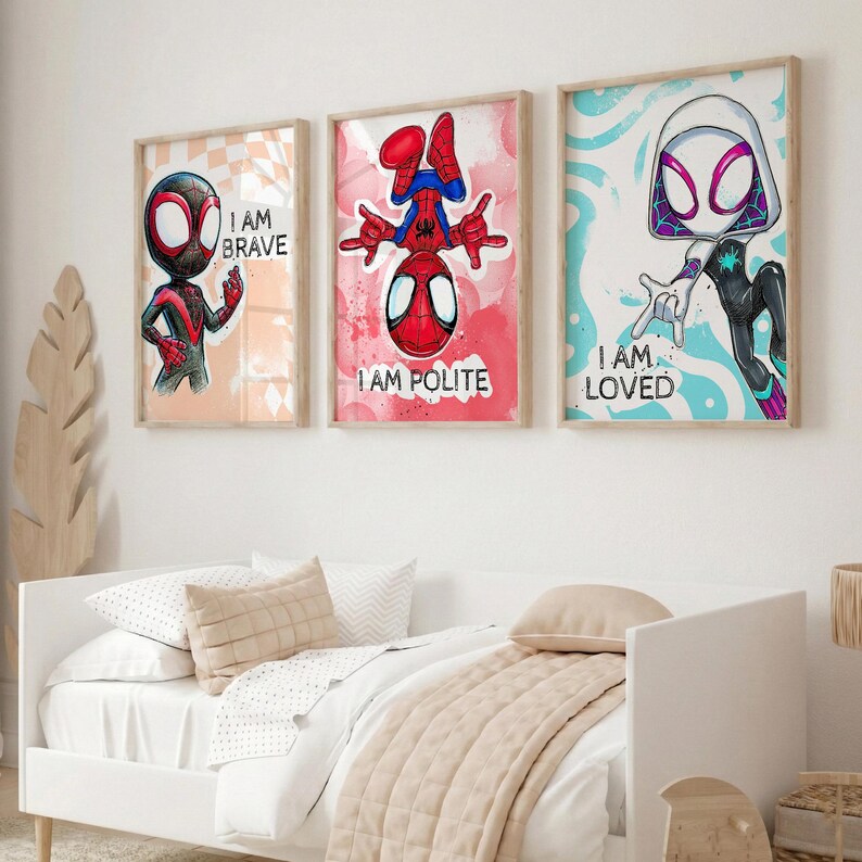 May include: Three framed superhero art prints. The prints feature Spider-Man characters with the phrases "I AM BRAVE", "I AM POLITE", and "I AM LOVED". The artwork has a watercolor style with a light wood frame.