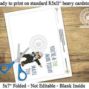 May include: A printable 5x7 inch folded card with a cartoon illustration of a man wearing a blue suit and a yarmulke. The text on the card reads "You're a the man today" and "Mazel Tov".