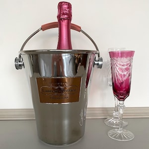 LAURENT PERRIER Champagne bucket/Polished stainless steel champagne bucket with leather-covered handle and gold plate on front, Brand new