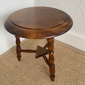 French tripod stool in solid wood with twisted legs, turned wood saddle, Vintage MID -Century, XX century,