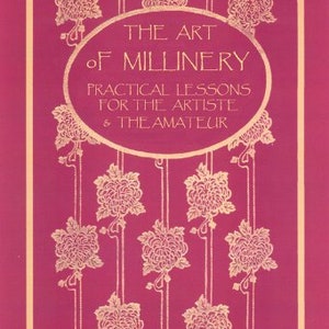 Może przedstawiać: Okładka starej książki z różowym tłem i złotymi napisami. Tytuł to "The Art of Millinery: Practical Lessons for the Artiste & the Amateur".