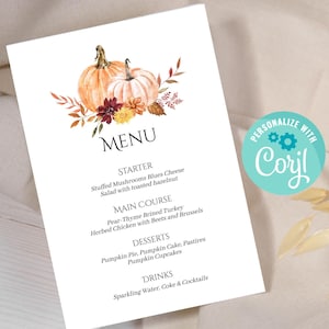 May include: A white menu card with a watercolor illustration of pumpkins and fall foliage. The word "MENU" is at the top, followed by a list of dishes. A teal circle with the text "PERSONALIZE WITH Corjl" is in the corner.