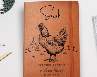 May include: A brown leather journal with the name "Sarah" in script. A detailed illustration of a chicken is featured, along with the text "Chicken Raising & Jesus Praising Since 2012". A ruler is visible.