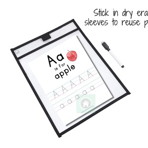 May include: A dry-erase learning sheet with a black frame and a red apple illustration. The sheet features the letter "A" and the phrase "Aa is for apple" with dotted lines for tracing the letter.