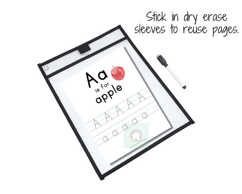 May include: A dry-erase learning sheet with a black frame and a red apple illustration. The sheet features the letter "A" and the phrase "Aa is for apple" with dotted lines for tracing the letter.