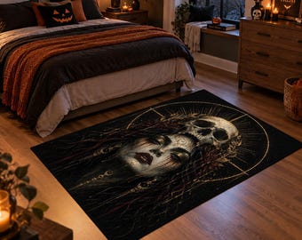 May include: A rectangular area rug featuring a dark, detailed illustration of a human face with closed eyes and a skull resting on the forehead. The design incorporates gold circular linework, radiating sunburst patterns, and deep red accents.