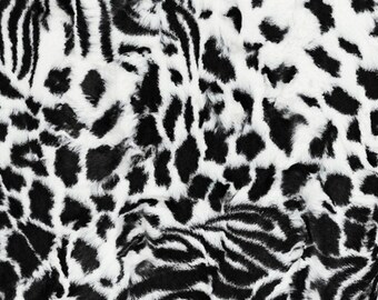 May include: Black and white animal print fabric with a zebra and leopard pattern.