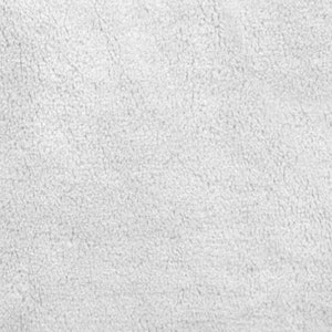 May include: Close-up of a white, textured fabric with a soft, fuzzy surface.