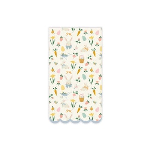 May include: A rectangular, off-white Easter-themed napkin with a scalloped blue border. The napkin features a repeating pattern of bunnies, carrots, eggs, flowers, and strawberries in pastel colors. The design is whimsical and suitable for spring celebrations.