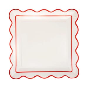 May include: A square white paper plate with a scalloped red border. The plate has a simple, clean design, perfect for serving food at a party or event. The red border adds a pop of color and visual interest.