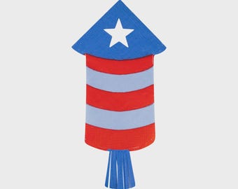 May include: A patriotic-themed firework illustration. The design features a blue top with a white star, red and light blue stripes, and blue fringe at the bottom. The firework is set against a white background.