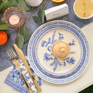 French toile dessert plate with pastry and gold cutlery