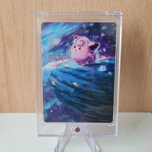 May include: A pink and white Pokemon character stands on a blue and purple rock formation against a starry background. The character is surrounded by small, white stars.