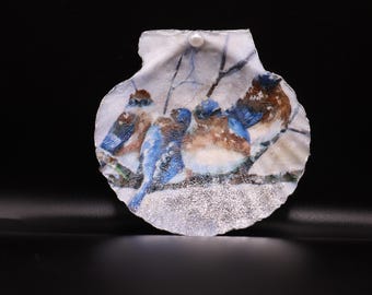 Adorno de concha de vieira de pájaro azul
