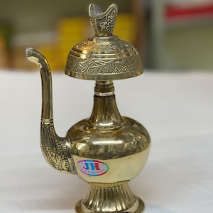 Tibetan Sacred Water Vase with Feather  /Brass Bumpa / Buddhist Ritual Vessel