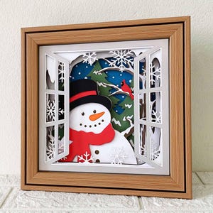 Sneeuwpop bij raam 3D-schaduwdoos SVG/sneeuwpop en kardinaal Papercut/ Cricut kerst/3D laag karton sneeuwpop/voor Cricut/Voor silhouet
