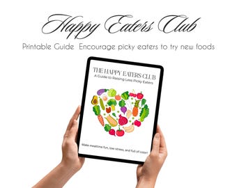 May include: A tablet displays "Happy Eaters Club" and "A Guide to Raising Less Picky Eaters." The screen features a heart-shaped arrangement of colorful vegetables and fruits. The text encourages picky eaters to try new foods.
