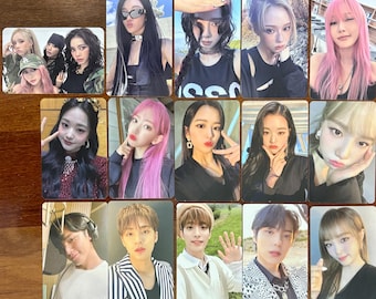 May include: A set of 16 photo cards featuring different people. The cards are all rectangular and have a white border. The people in the photos are all wearing different outfits and have different hairstyles. Some of the people are smiling, while others are looking serious.