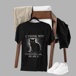Gothic style cat top with ironic philosophy text