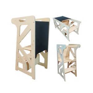 May include: Three wooden learning towers with steps and a chalkboard panel. The towers are made of natural wood and have a simple, modern design.