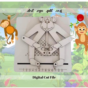 Peut inclure: Un fichier de découpe numérique représentant un singe tenant une règle graduée de 1 à 132. Le singe porte une veste avec une poche sur laquelle est inscrit "66". Le motif est intitulé "Fichier de découpe numérique".