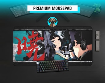May include: Black rectangular mousepad featuring an anime-style illustration of a woman with long black hair. The mousepad has the text "PREMIUM MOUSEPAD" and a colourful keyboard is in the foreground.