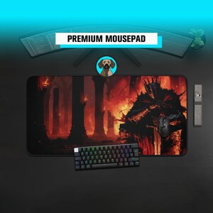 May include: A black mousepad with a fantasy art design featuring a dark figure in armor against a fiery background. The mousepad is paired with a black mouse and a colorful keyboard. The text "PREMIUM MOUSEPAD" is displayed.