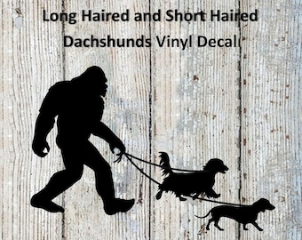 Bigfoot/Sasquatch Walking His Long Haired and Short Haired Dachshunds Vinyl Decal