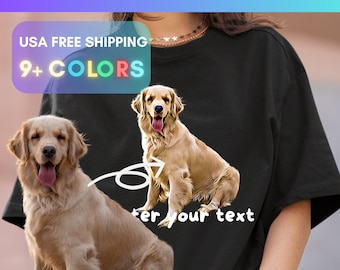 May include: Black t-shirt featuring a custom pet photo design. The image shows a golden retriever illustration with an arrow and the words "enter your text". The text "CUSTOM PET PHOTO T-SHIRTS" is at the top. The shirt is available in 9+ colors.