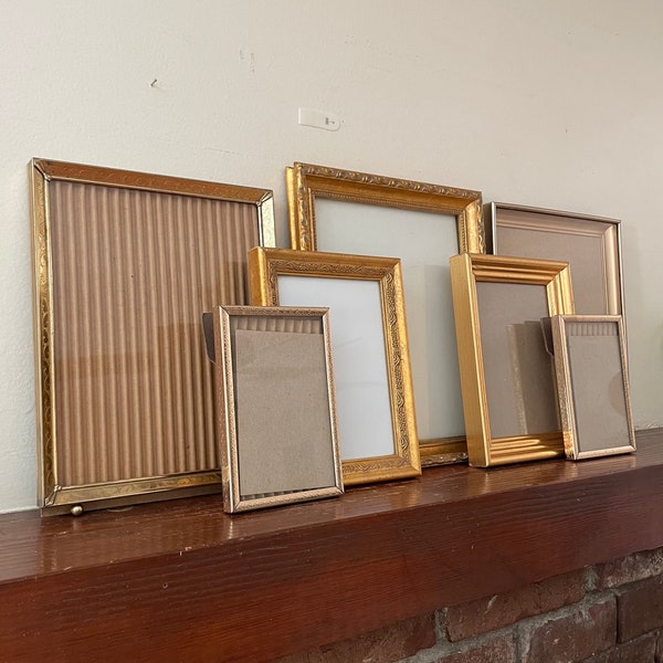 Vintage assortes gold toned frames lot, Curated vintage frames, Vintage gallery wall frames, Mismatched set of 7 gold frames