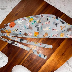 Euro Style Scrub Cap – Grey Dogs & Cats Print | Bun Cover Scrub Hat with Ties | Veterinary, Nurse, Tech, Dental, OR Cap | Unisex | Medical