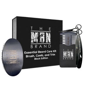 May include: A black "The Man Brand" beard care kit. The kit includes a brush, comb, and trim tools. The box and tools are black with white text. The text on the box reads "Essential Beard Care Kit Brush, Comb, and Trim Black Edition."