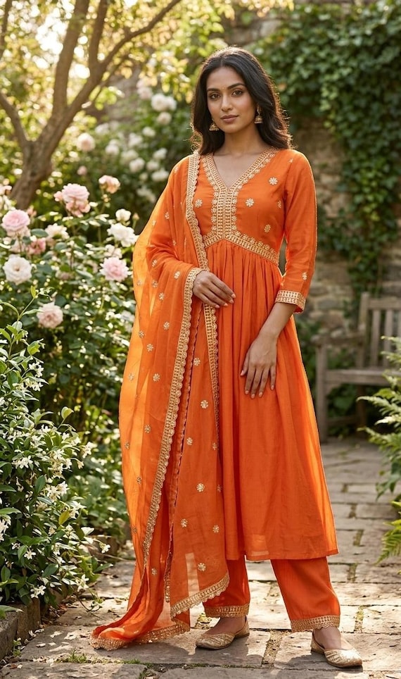 orange party dress pakistani Mustard Orange Embroidered Pakistani Kameez Sharara Party Dress exemplifies  exclusive cutwork, superior details on lustrous draperies for your  approaching