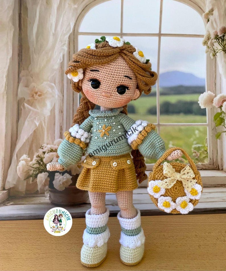 May include: A handmade crochet doll with brown hair adorned with a daisy crown. The doll wears a green sweater, a yellow skirt, and white boots. It holds a small basket decorated with daisies and a bow. The doll is standing in front of a window.