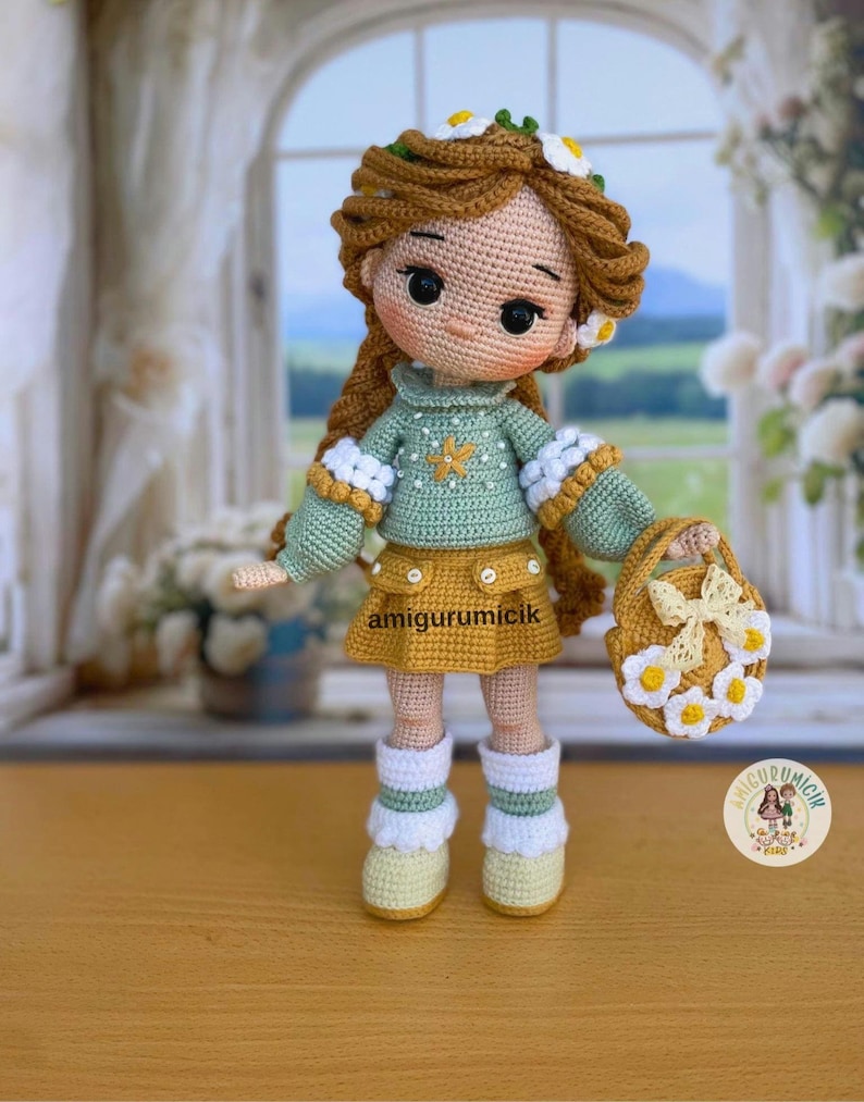 May include: A handmade crochet doll with brown hair, wearing a green sweater, yellow skirt, and white boots. The doll has a daisy crown and carries a small purse decorated with daisies. The doll is standing in front of a window.