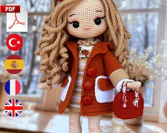 May include: A handmade crochet doll with long, wavy blonde hair and a red bow. The doll wears a rust-colored coat with white trim, a striped dress, and matching boots. She holds a small red purse. The doll is standing on a wooden surface.